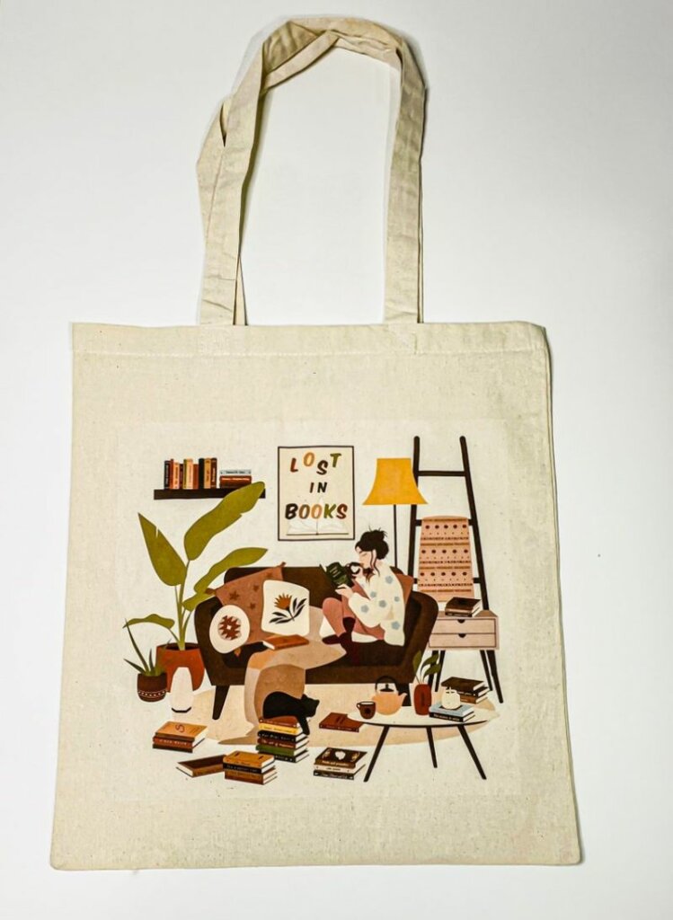 Eco friendly tote bag with book illustration