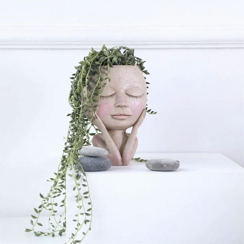 beautiful finds - girl face head in resin for plants