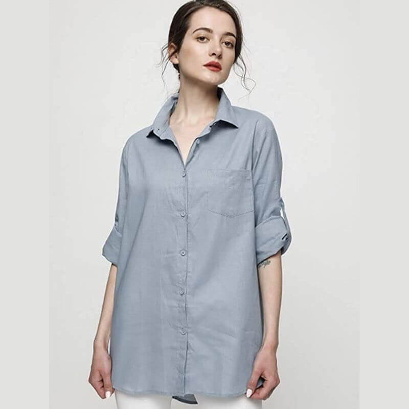 woman wearing blue long linen shirts