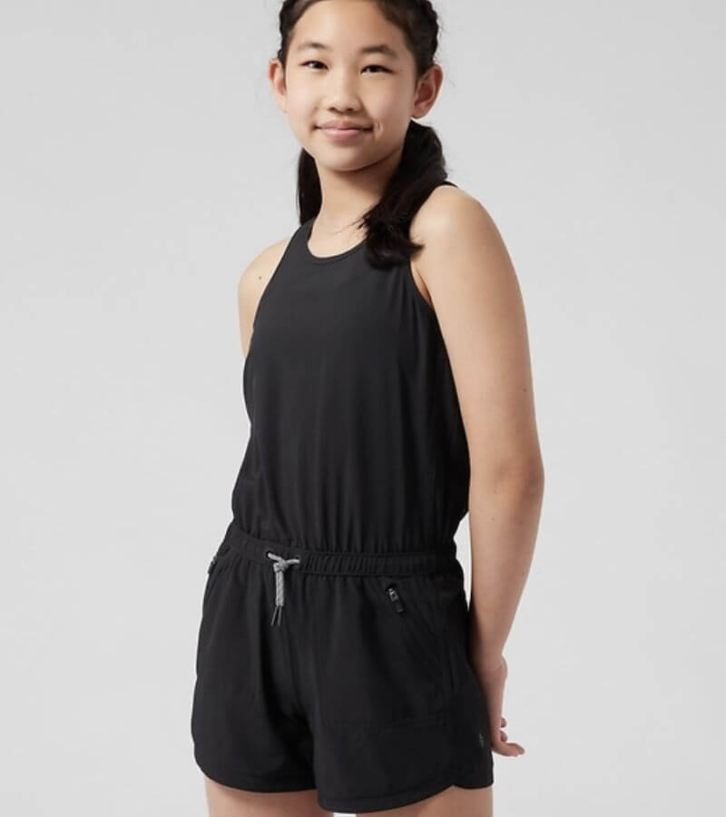 girl wearing black romper for middle school