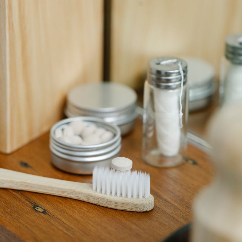 bamboo toothbrush and toothpaste tablets