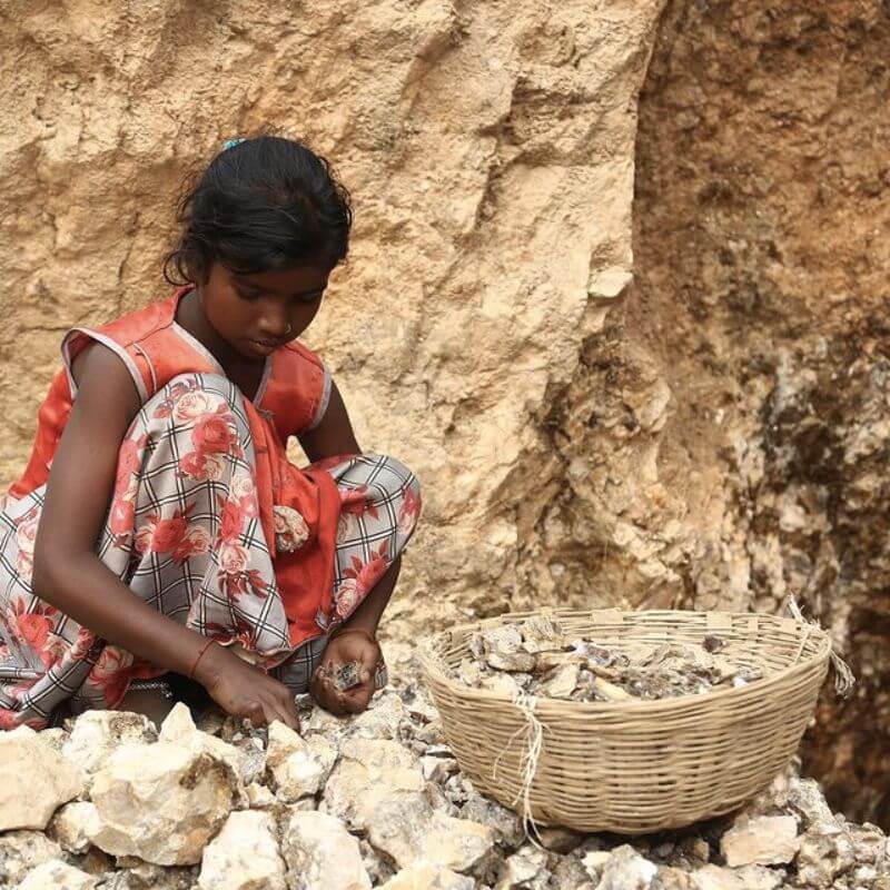 a girl working in a mining site