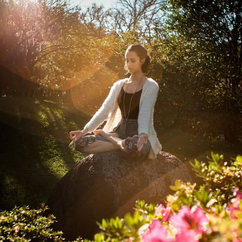 girl meditating in nature